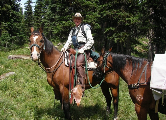  Edwin riding at Lone Lake riding Gordie and packing Floyd. Photo by Cyndi Smith 2007. 